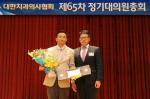 (왼쪽부터)정협 인천장애인치과진료봉사회 부회장, 오희수 동화약품 상무.