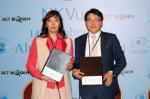 지난 14일 MOU 체결식에서 에이티젠 조용환 전무(사진 오른쪽)와 카자흐스탄 방사선 종양학 연구소장 엘레나 킴(사진 왼쪽)이 기념 촬영을 하고 있다.