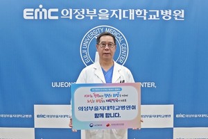 ▲ 송헌 병원장이 인구문제 인식개선 릴레이 캠페인에 동참했다.